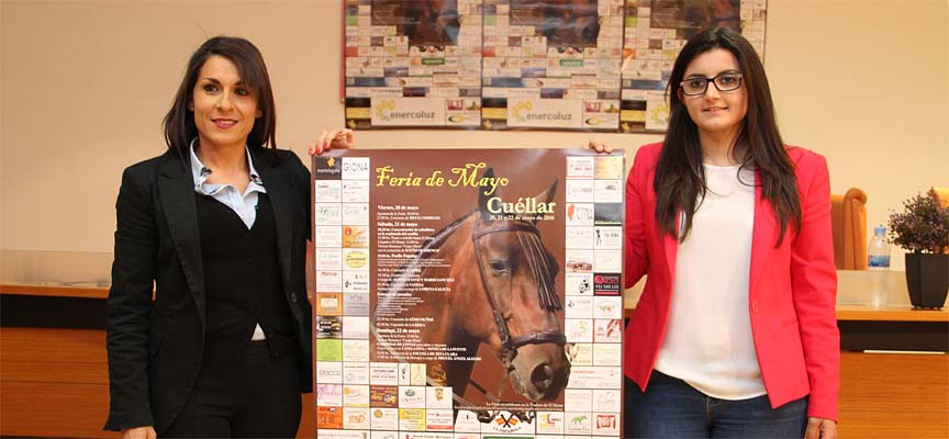 Ainhoa Iglesias y Laura Suárez muestran el cartel de esta edición de la Feria.
